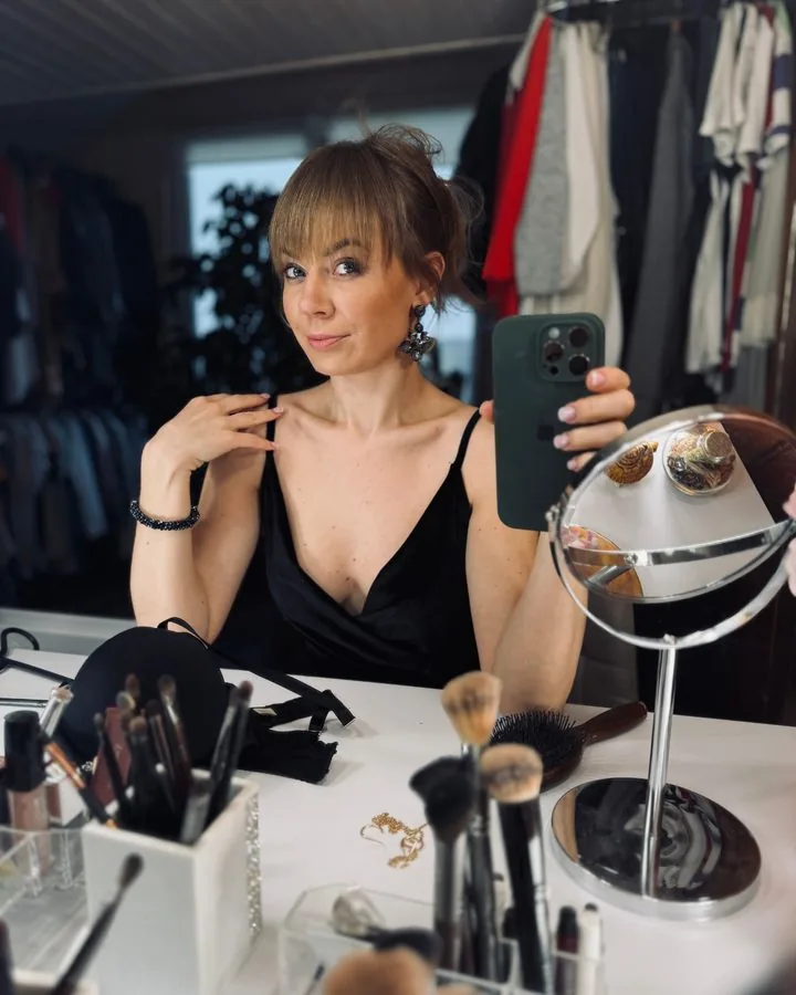 Creator in her 40s at her vanity table
